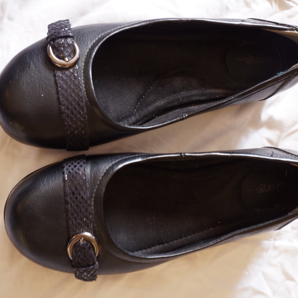 Black flats with buckle detail